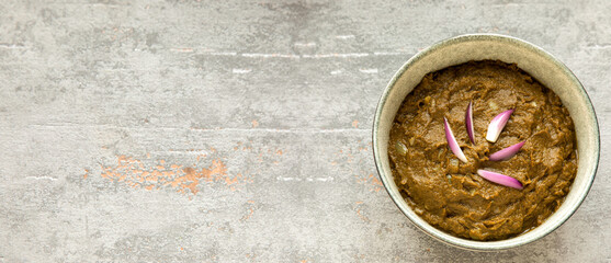 Sarson ka saag traditional Indian dish, cooked pureed mustard leaves. Homemade food meal banner.