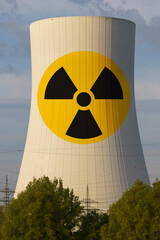 On the cooling tower of a nuclear power plant there is a sign - Beware of radiation