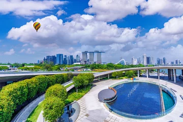 Gordijnen Colorful balloon with cityscape view of Singapore from Marina barrage park Singapore © chanchai