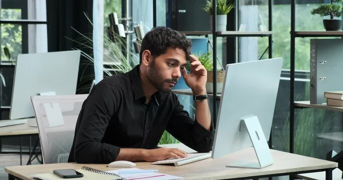 Dedicated entrepreneurs are hard at work in the office, each focused on respective tasks at the computer. Their collaborative efforts contribute to the productivity and success of business endeavors.
