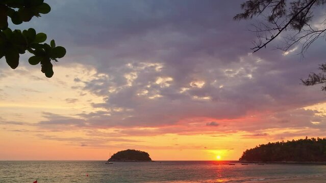 .stunning sunset in channel between islands. .Pu island is in the middle between Kata beach and Karon beach in Phuket..Nature video High quality footage in nature and travel concept..