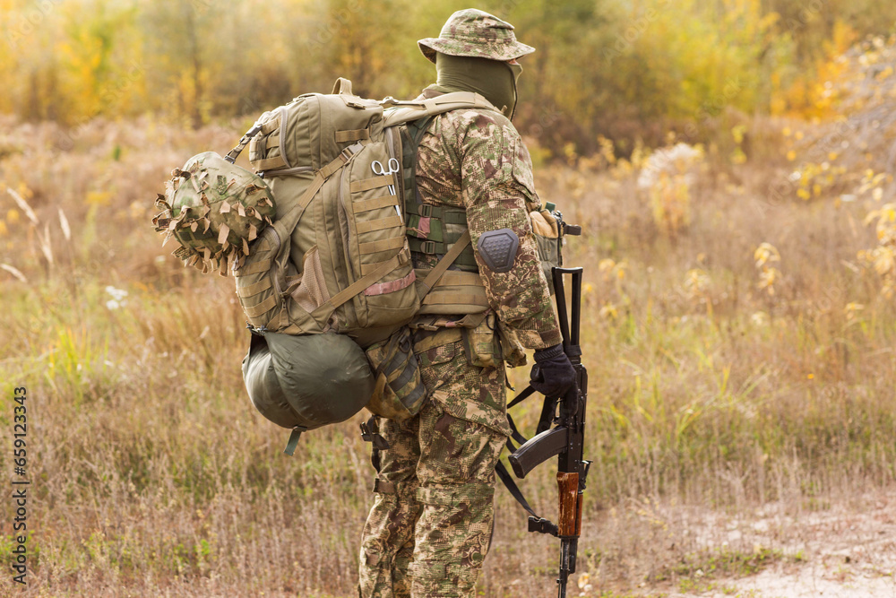 Wall mural Ukrainian soldier in military uniform 