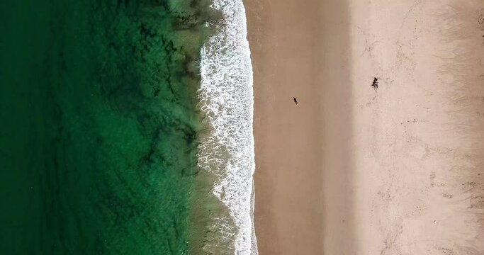 Aerial view, fly over of waves on Tarifa beach with surfer and tourists, Tarifa, Costa de la Luz, Andalusia, province of C&aacute;diz, Spain, Travel, Tourism