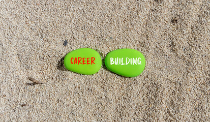 Career building symbol. Concept words Career building on beautiful green stone. Beautiful sea sand beach background. Business, motivational career building concept. Copy space.