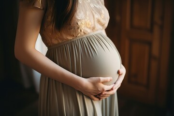 Pregnant Woman Embracing Her Belly