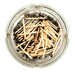 Ashtray with burnt matches on a white background. View from above. Smoking
