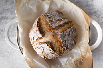 top view of sourdough bread loaf . home baker and baking concept.