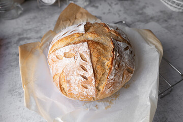 The sourdough artisan loaf bread make at home. Healthy bread for cooking and baking concept. Chef pastry.
