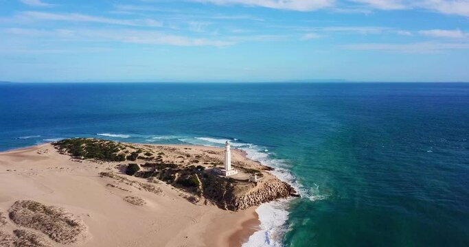 Faro de Trafalgar, aerial view of the lighthouse at a sandy headland with dunes between Los Ca&ntilde;os de Meca and Zahora, Conil de la Frontera, Vejer de la Frontera, Costa de la Luz, Andalusia, Spain	