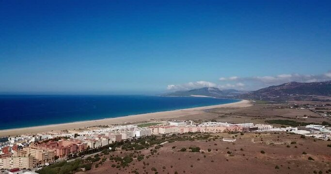 aerial view of Tarifa and the beach, the Atlantic Ocean at the Costa de la Luz, the Strait of Gibraltar and Morocco at the horizon, Cadiz, Andalusia, Spain