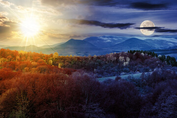autumn landscape with sun and moon at twilight. forest in the mountains covered with red and yellow foliage. day and night time change concept. mysterious countryside scenery in morning light
