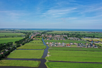 Aerial view of over Historic Dutch Waterland landscape in June,Polder de hobrederkoog near Oosthuizen , Hobrede The Netherlands