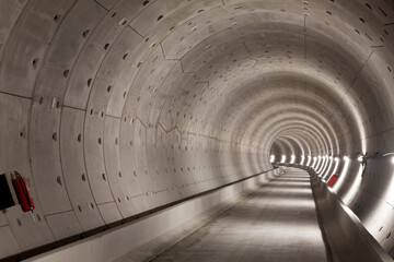 Subway tunnel under construction of the north south subway line of Amsterdam. with a concrete floor...