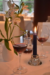 An evening by candlelight conjures a scene of warmth, intimacy, and timeless charm