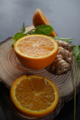 Obraz na płótnie Canvas lemon and orange with mint and ginger