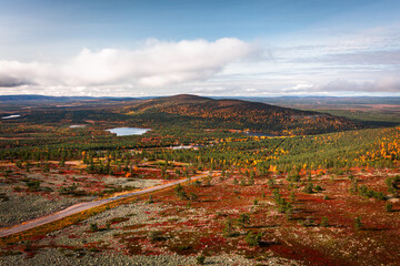 Aerial view of Levi fell, forest and ski slopes with autumn colors in Lapland, Finland