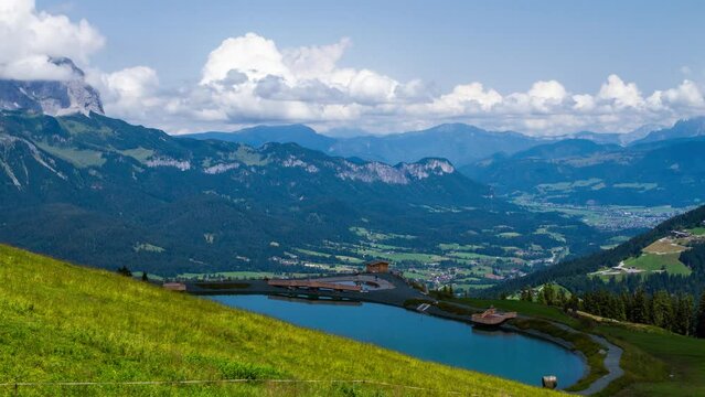 Timelapse view of Speichersee reservoir and Wilder Kaiser mountain massif in Ellmau, Austrian alps