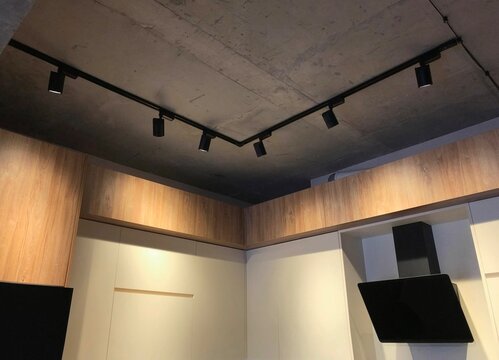 Kitchen lighting, black spot track lights led, interior in modern loft design
