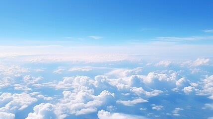Panoramic view of fields and clouds from an airplane window. The sky is a bright blue with fluffy white clouds. - obrazy, fototapety, plakaty