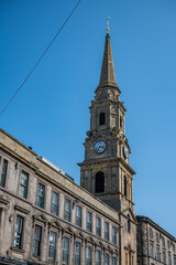 Fototapeta na wymiar Inverness Town Steeple Tolbooth clock tower, low angle view, vertical shot, Scotland