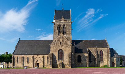 Fototapeta na wymiar Church with parachute memorial Sainte-Mère-Église, Normandy