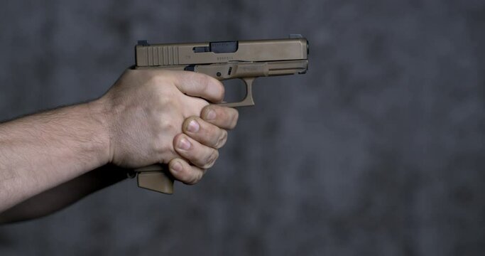 Shooting with a Sig Sauer P320 9mm close-up pistol in super slow-motion 800 fps