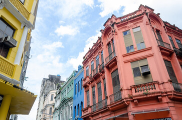 Facade of an old and historic building painted red, in the Comercio neighborhood in the city of Salvador in Bahia.