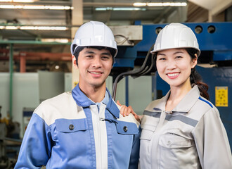 workers in factory, two professional engineer,