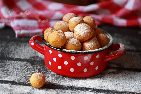 Fritule - Croatian mini doughnuts. Selective focus