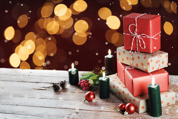 Naklejka na ściany i meble Christmas gift boxes with decoration on the table