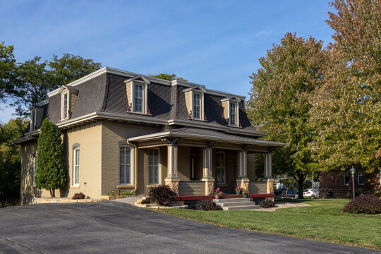 William Irving House, a historic home built in 1873 in Second Empire style architecture with a bellcast mansard roof and dormers, on September 30, 2023, in Mankato, Minnesota.