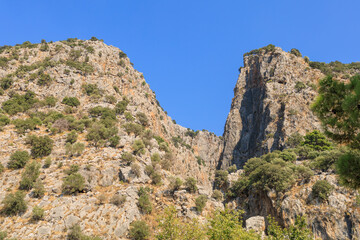 Fototapeta na wymiar Saklikent canyon in Turkey. Natural landmark, popular place for tourists to visit. Background