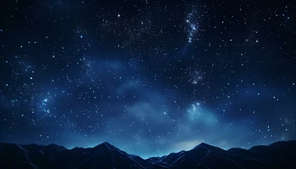 Fotobehang A starry night sky over majestic mountains © KWY