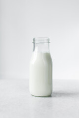 milk in a glass bottle, vegan and alternative milk in a bottle, milk for baking