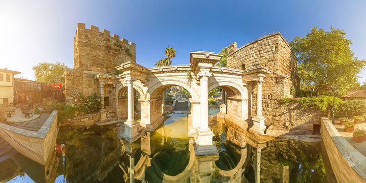 The ancient archway Hadrian's Gate in Antalya of Turkey, marvel of Roman architecture. dating to 2nd century AD. Welcomes visitors with its grandeur offering a glimpse into city's rich historical past