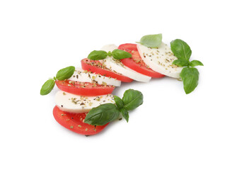 Tasty salad Caprese with mozzarella, tomatoes, basil and spices on white background