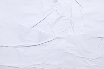 Obraz premium Texture of white creased paper as background, top view. Wall poster