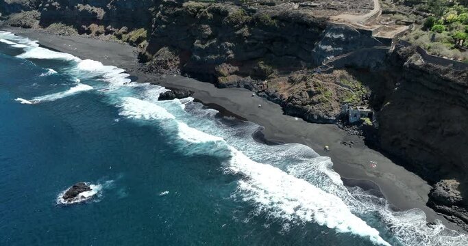 Aerial View of Playa Los Patos, Tenerife, Canary Islands, Spain &mdash; Ocean Waves, Beach, and Coastal Landscape