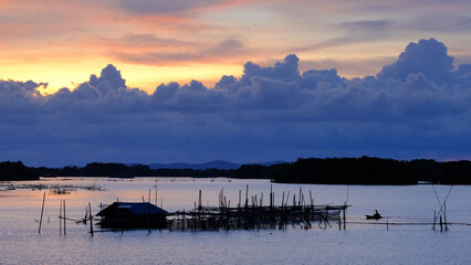 Pictures of the fishing village at Ban Bang Sa Kao, Chanthaburi Province, during the rainy season.