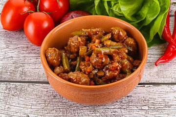Meatball with vegetables and spices