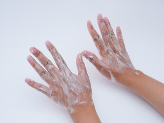 hand washing with foam of soap isolated on white background