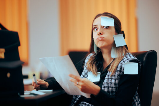 Busy Businesswoman Being Covered in Sticky Notes Working. Stressed office worker using written memos to organize her business strategy 
