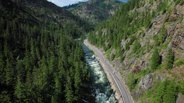 Road Trip Aerial on Mountain Highway by Scenic River