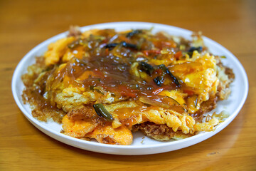 A delicious Chinese home-cooked dish, fried eggs with five fillets