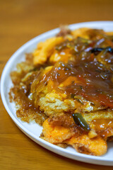 A delicious Chinese home-cooked dish, fried eggs with five fillets