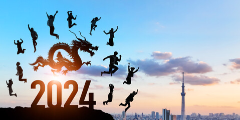 ドラゴンとジャンプする人々　2024年新年イメージ　令和六年年賀状素材