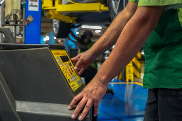 Close up view of a Maintenance Car service - auto oil change, motor check, brake cleaning, tire check, engine inspection, motor oil-brake inspection