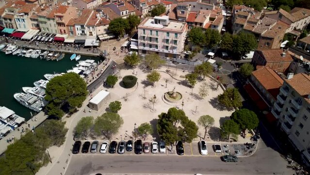 Large statue at town square Visit of Creeks in Cassis France on a sunny day. Drone panning shot