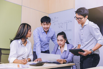 Business peoples meeting to discuss the situation on business plan, marketing and business result. Selected focus.