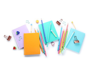 Notebooks and school stationery on white background